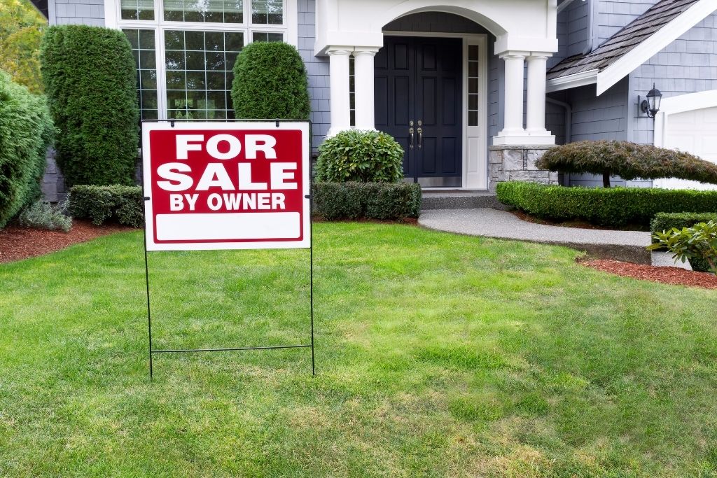 for sale signage in front of house back on market